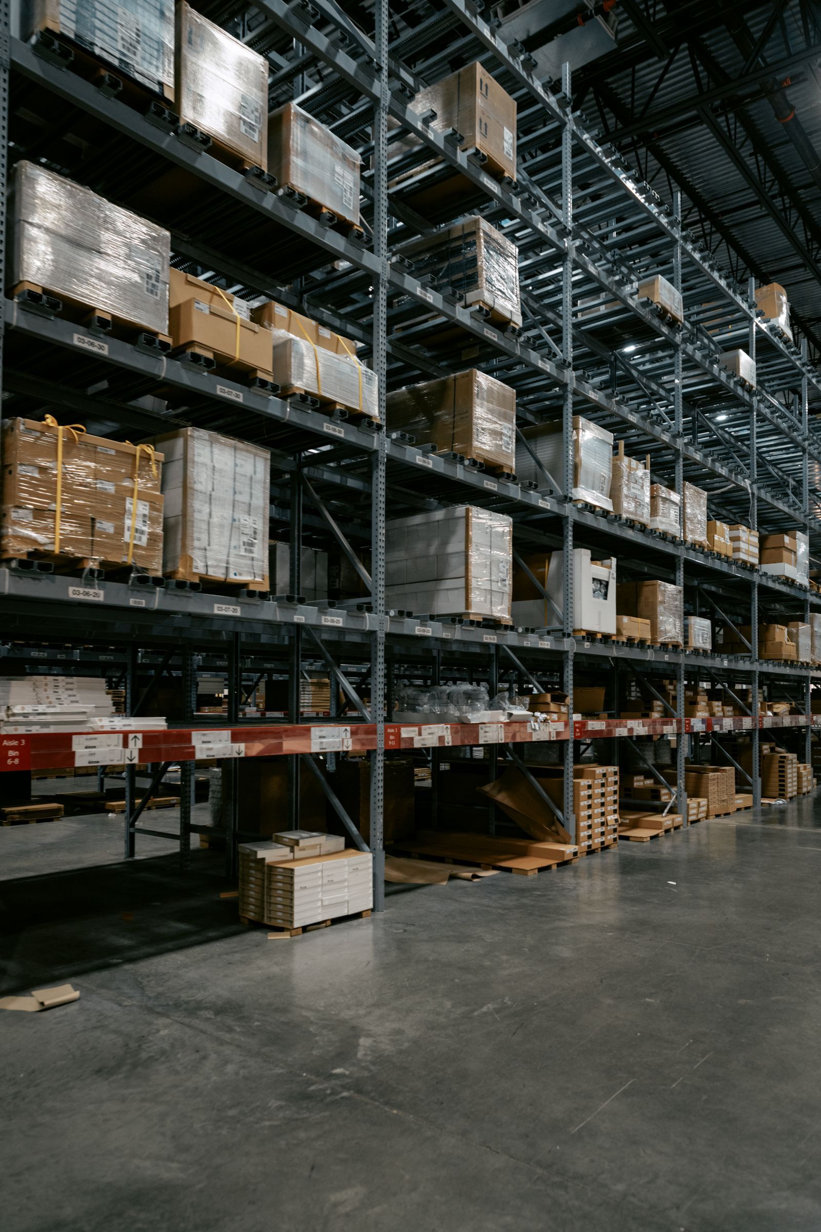 Organised warehouse with stocked shelves